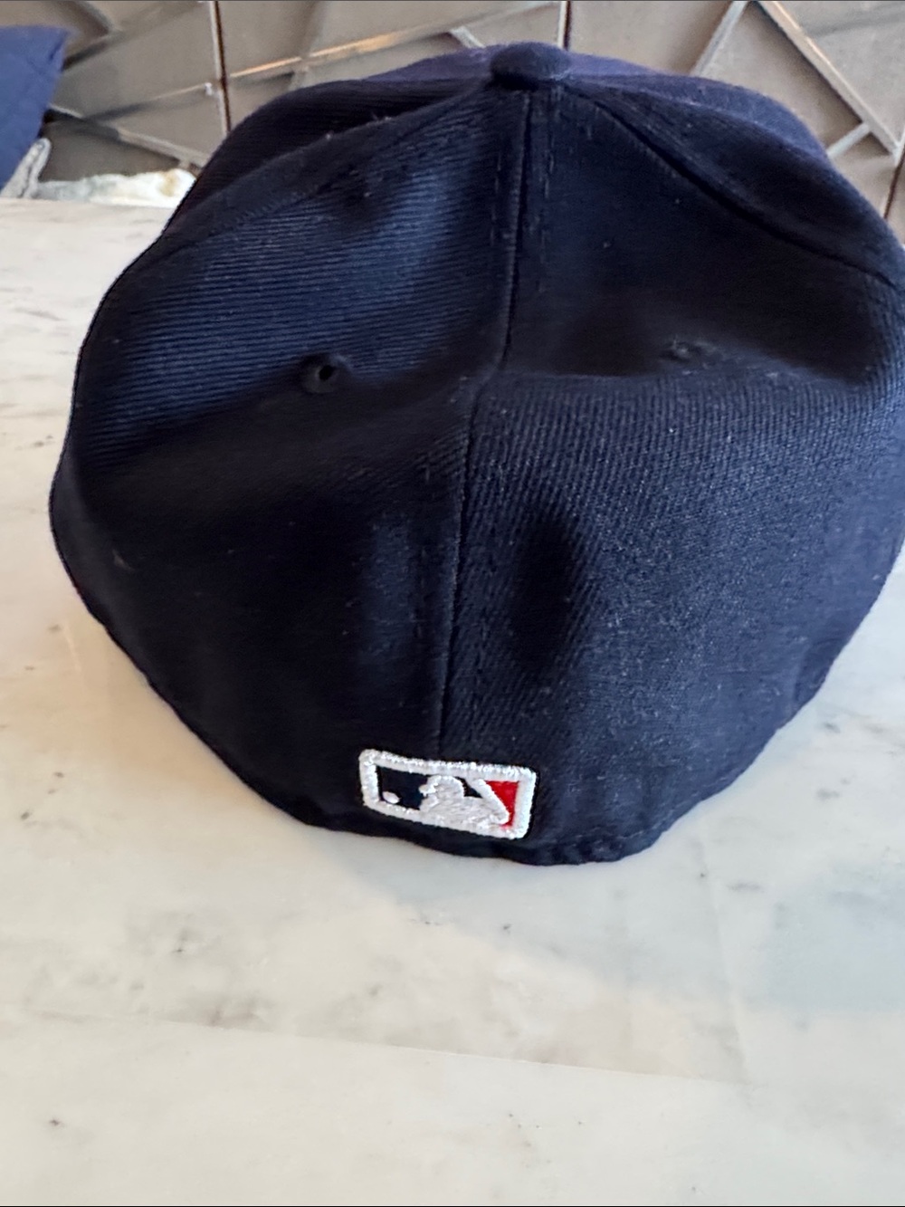 Cap on Table - Picture 2 of 4
